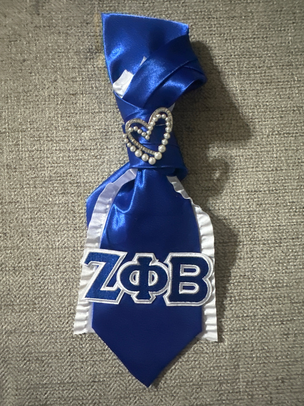 JLJ Signature Ties with pearl necklace