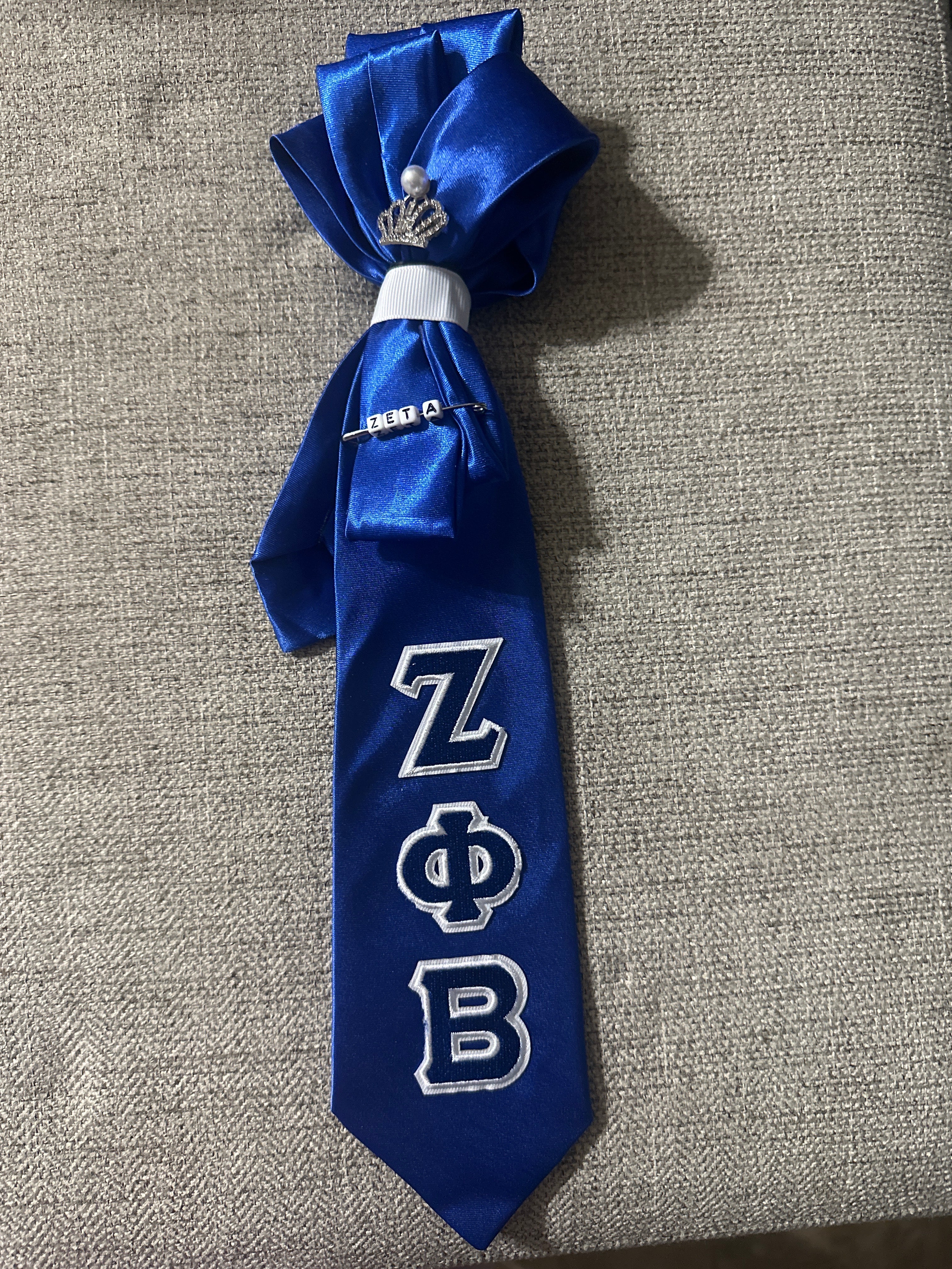 JLJ Signature Ties with pearl necklace