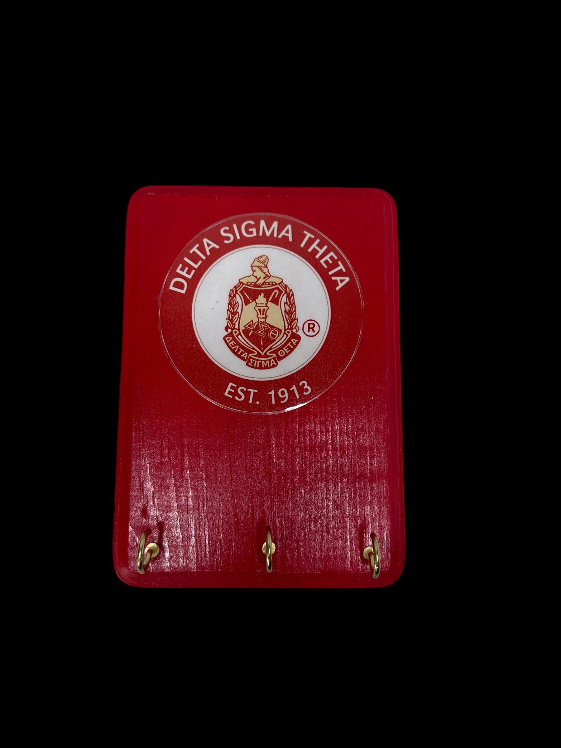 Delta key holder with hooks