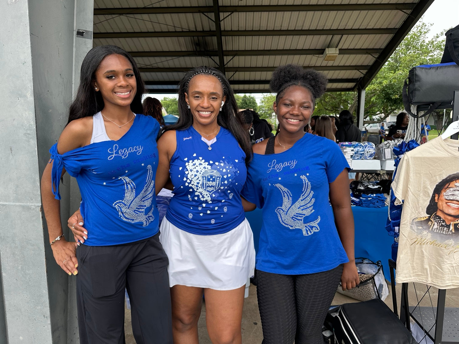Jasmine, Maliyah and Madison wearing custom JLJ apparel at an event