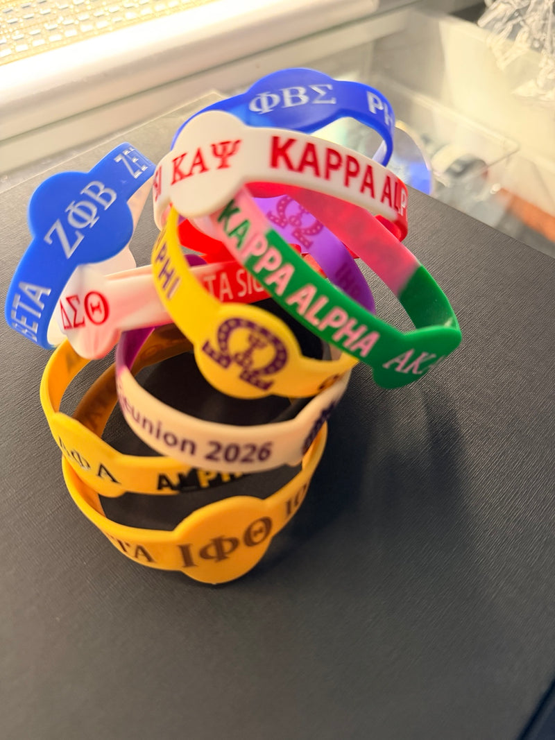 Custom silicone bracelets in multiple colors for organizations, schools, reunions and companies
