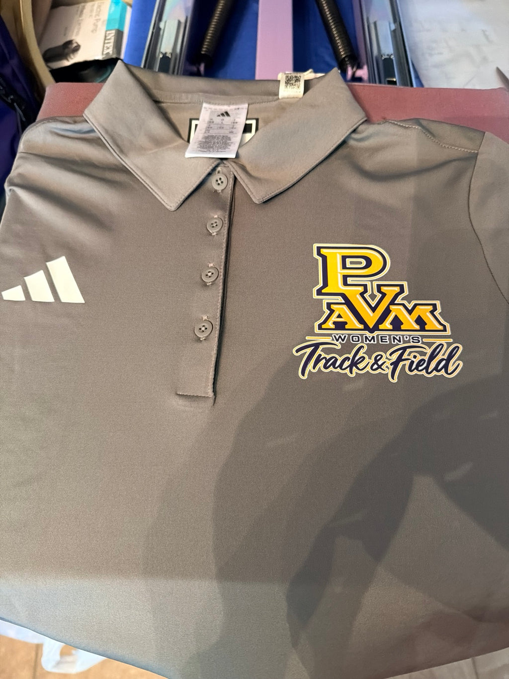 Custom Prairie View A&M women's track and field polo by JLJ Concierge Services
