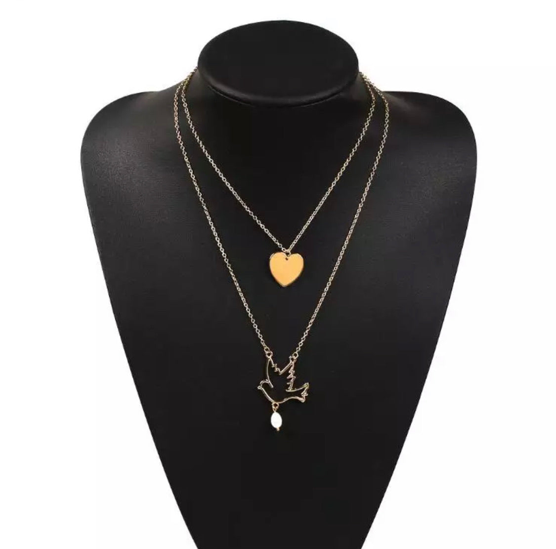 1 pearl & dove gold colored necklace