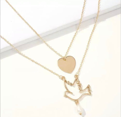 1 pearl & dove gold colored necklace