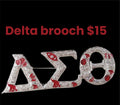 Delta brooch